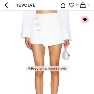 Ember mini skirt in white. By more to come